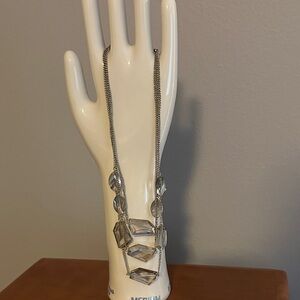 Kenneth Cole. Costume jewelry. Silver chain with clear crystal baubles.